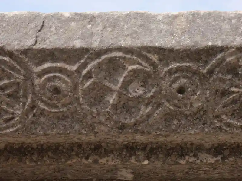 Solar cross in between circle dots at ancient church of Mary